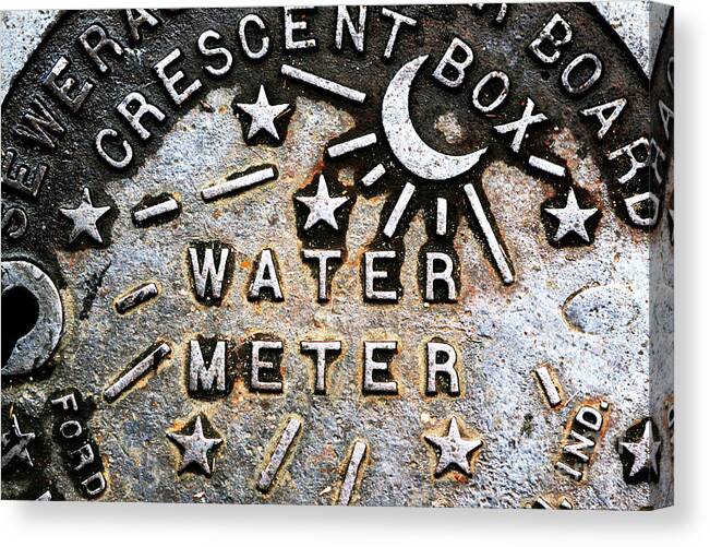 New Orleans Water Meter Cover Canvas Print featuring the photograph Retro New Orleans Water Meter Cover by John Rizzuto