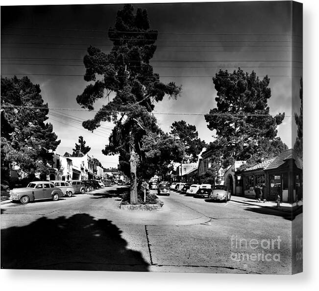 Ocean Avenue Canvas Print featuring the photograph Ocean Avenue at Lincoln St - Carmel-By-The-Sea, CA Cirrca 1941 by Monterey County Historical Society