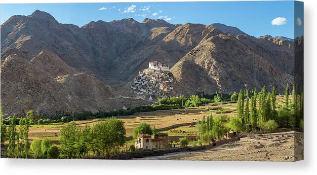 Extreme Terrain Canvas Print featuring the photograph Chemre Or Chemrey Village & Monastery by Peter Adams
