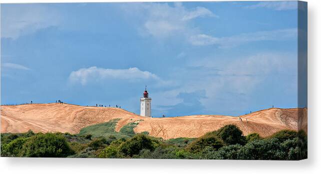 Lighthouse Canvas Print featuring the photograph Lighthouse on sand dunes by Mike Santis