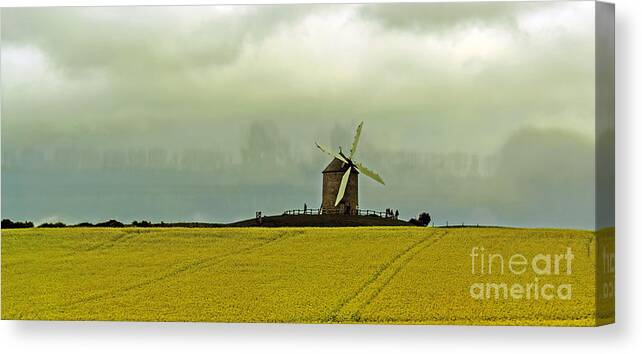 Travel Canvas Print featuring the photograph Windmill and Rapeseed and Storm by Elvis Vaughn