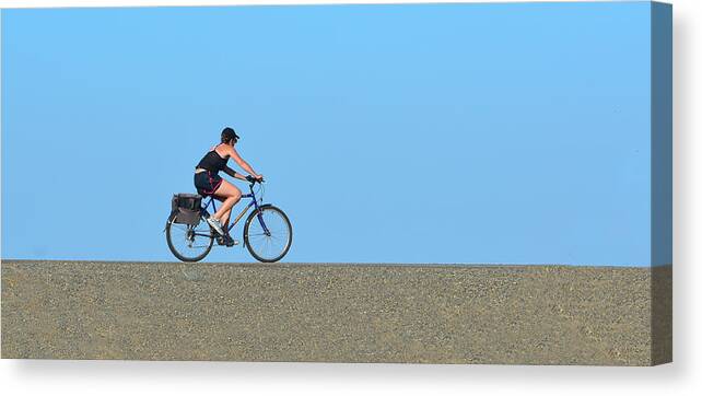 Bike Canvas Print featuring the photograph Bike Rider on Levee by Josephine Buschman