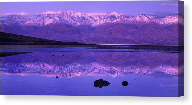 North America Canvas Print featuring the photograph Panorama Badwater and the Panamint Range at Sunrise Death Valley by Dave Welling