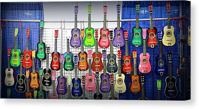 Music Canvas Print featuring the photograph Ukuleles at the Fair by Lori Seaman