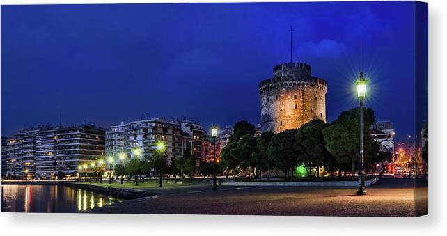 White Tower Canvas Print featuring the photograph The White Tower of Thessaloniki night view by Alexios Ntounas