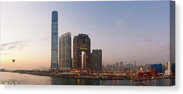 New Territories Canvas Print featuring the photograph New China Neon Skyscrapers Illuminated by Fotovoyager