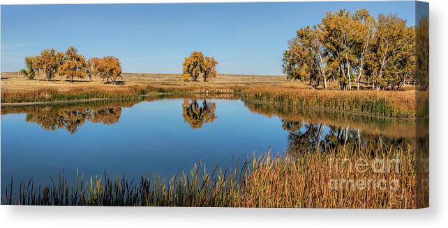  Reflection Canvas Print featuring the photograph The Warmth of Autumn by Jim Garrison