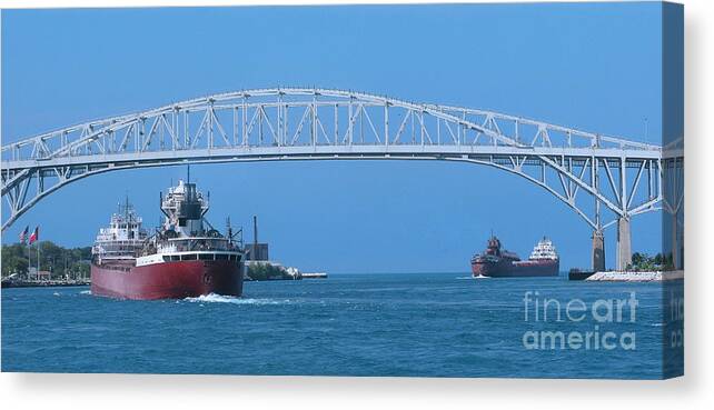 Freighter Canvas Print featuring the photograph Blue Water Bridge and Freighters by Ann Horn