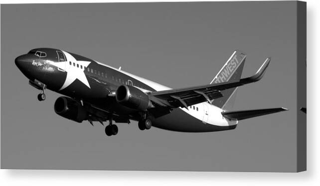 Airplane Canvas Print featuring the photograph Lone Star Southwest Plane by Daniel Woodrum
