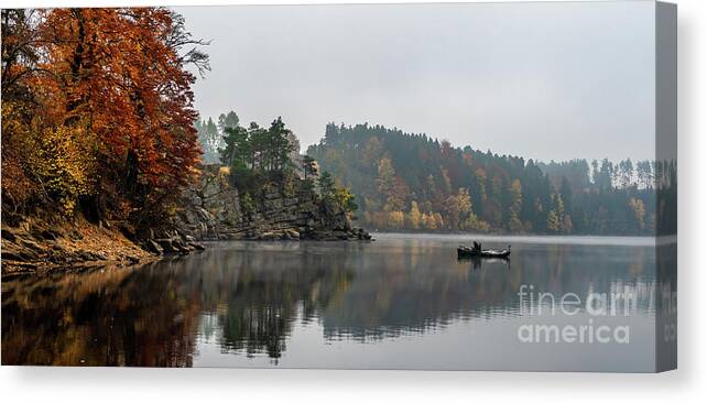 Austria Canvas Print featuring the photograph Foggy Landscape With Fishermans Boat On Calm Lake And Autumnal Forest At Lake Ottenstein In Austria by Andreas Berthold