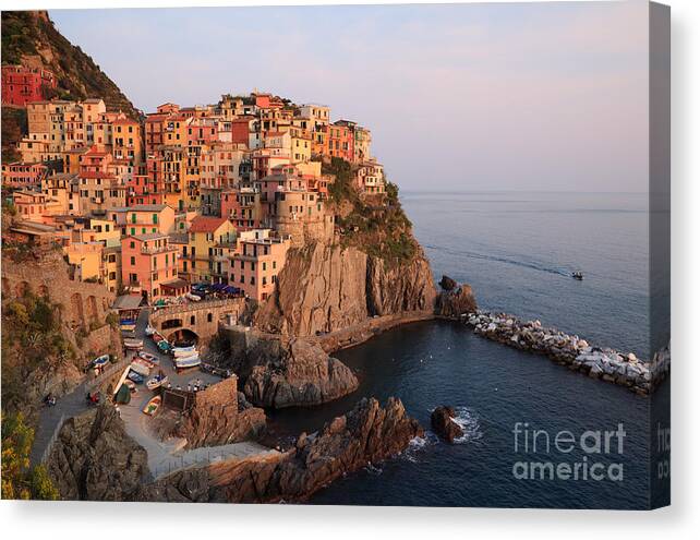 Cinque Terre Canvas Print featuring the photograph Manarola at sunset in the Cinque Terre Italy by Matteo Colombo