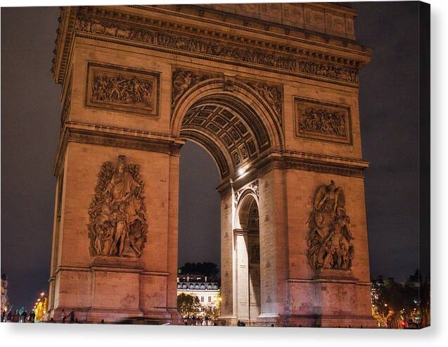 Arch Canvas Print featuring the photograph Arc De Triomphe Night Glow by Portia Olaughlin