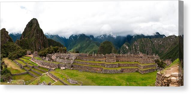 Aguas Calientes Canvas Print featuring the photograph Machu Picchu main square and the group of the three doorways by U Schade