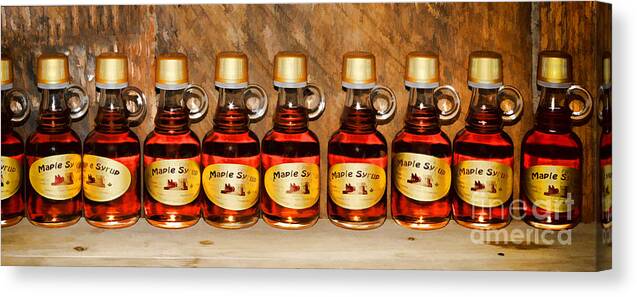 Maple Canvas Print featuring the photograph Maple Syrup bottles - painterly by Les Palenik