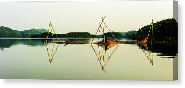 Tranquility Canvas Print featuring the photograph Triangles Of Bamboo Stick On Lake by Pham Le Huong Son