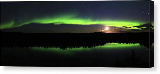 Northern Lights Canvas Print featuring the photograph Northern Lights Dancing with the Moon by Shixing Wen