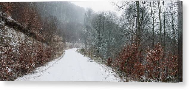 Scenics Canvas Print featuring the photograph Snowy winter trail by Mavroudakis Fotis Photography