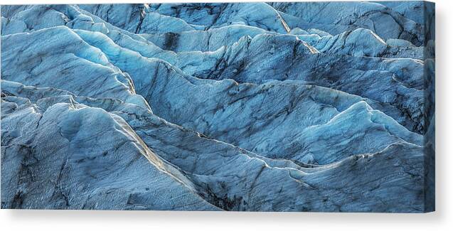 Black Canvas Print featuring the photograph Glacier Blue by Jon Glaser