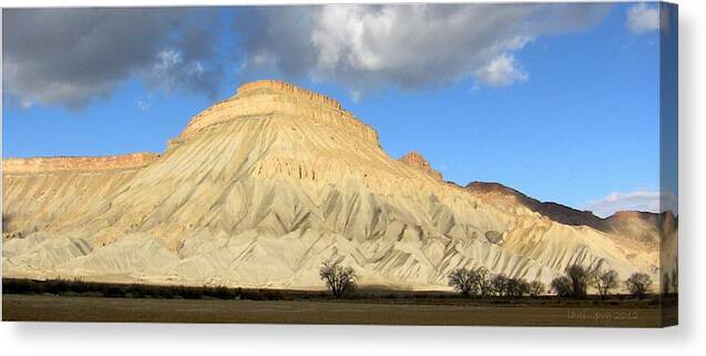 Bookcliffs Canvas Print featuring the photograph Clouds Over Gold by Lani Richmond Elvenia