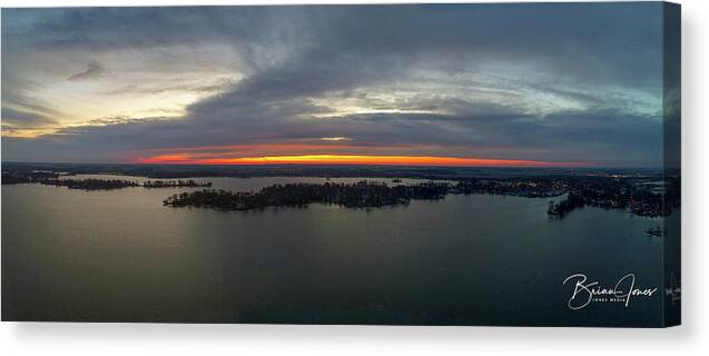  Canvas Print featuring the photograph Cloudy Sunrise by Brian Jones