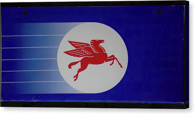 Mobiloil Blue Pegasus Sign Canvas Print featuring the photograph Mobiloil blue Pegasus sign by Flees Photos