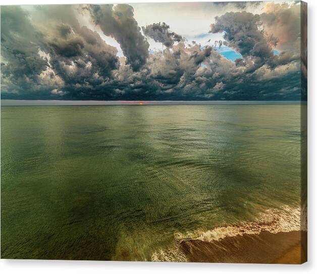 Beach Canvas Print featuring the photograph Stormy Sunset by Tommy Farnsworth