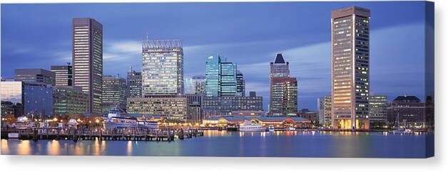 Photography Canvas Print featuring the photograph Panoramic View Of An Urban Skyline At #1 by Panoramic Images