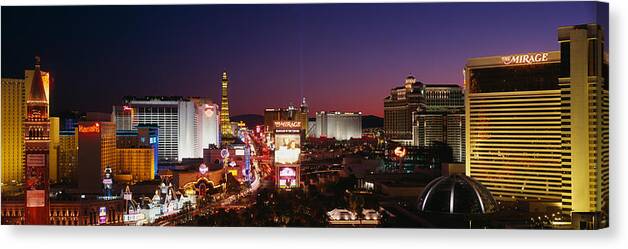 Photography Canvas Print featuring the photograph Buildings Lit Up At Night, Las Vegas #3 by Panoramic Images