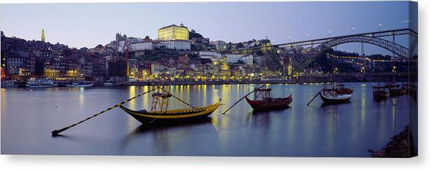 Photography Canvas Print featuring the photograph Boats In A River, Douro River, Porto by Panoramic Images
