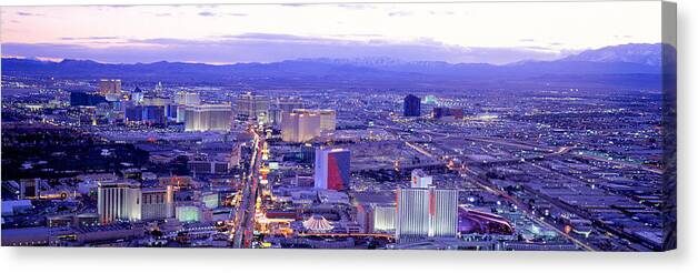 Photography Canvas Print featuring the photograph Dusk The Strip Las Vegas Nv Usa by Panoramic Images
