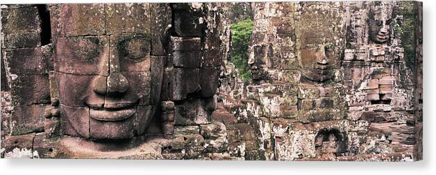 Photography Canvas Print featuring the photograph Stone Faces Bayon Angkor Siem Reap by Panoramic Images