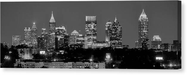 Atlanta Canvas Print featuring the photograph Atlanta Skyline at Night Downtown Midtown Black and White BW Panorama by Jon Holiday