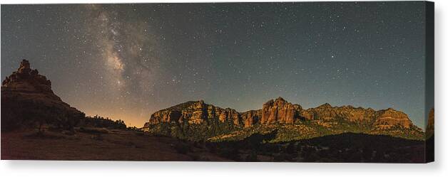 Milky Way Canvas Print featuring the photograph Panorama Milky way over Bell Rock, Arizona by Mati Krimerman
