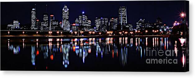 Montreal Canvas Print featuring the photograph Montreal Skyline by night by Frederic Bourrigaud