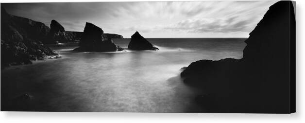 Panorama Canvas Print featuring the photograph Bedruthan steps Beach Cornwall Black and white by Sonny Ryse