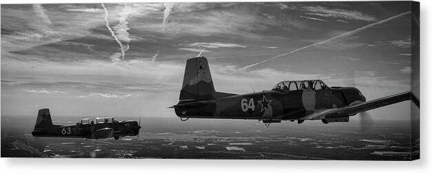 Black Canvas Print featuring the photograph Formation Flight in Black and White by Carolyn Hutchins
