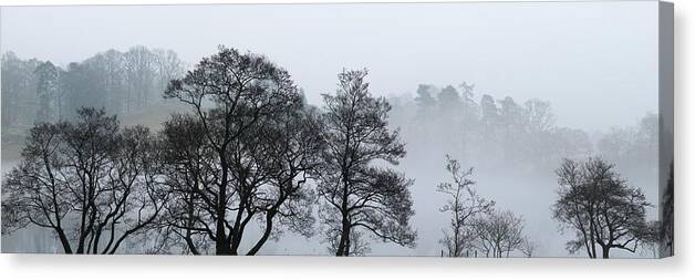 Panorama Canvas Print featuring the photograph Loughrigg tarn on a misty day lake district by Sonny Ryse