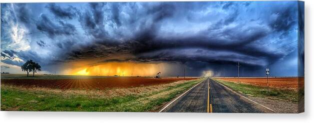 Landscape Canvas Print featuring the photograph Texas Stormy Sunset by Jerry Fletcher