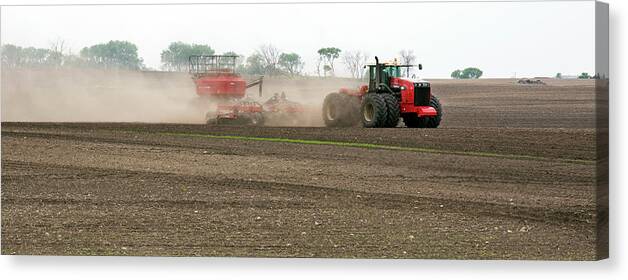 America Canvas Print featuring the photograph Tractor Ploughing A Field #1 by Jim West