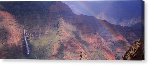 Photography Canvas Print featuring the photograph Rainbow Over A Canyon, Waimea Canyon by Panoramic Images