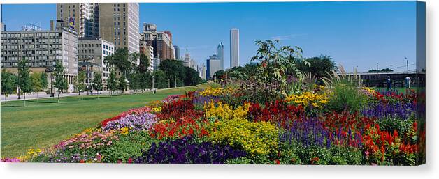 Photography Canvas Print featuring the photograph Flowers In A Garden, Welcome Garden by Panoramic Images