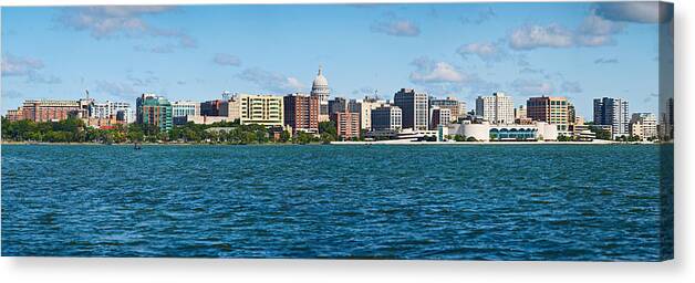 Expertise Canvas Print featuring the photograph Panoramic USA, Wisconsin, Madison, City skyline over Lake Monona Taken from Lake Monona, Madison's granite capitol building accents the city's skyline. by Matt Anderson Photography