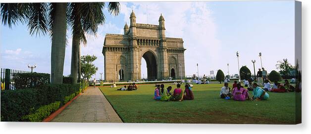 Photography Canvas Print featuring the photograph Tourist In Front Of A Monument, Gateway by Panoramic Images