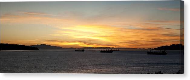 Sunset Canvas Print featuring the photograph Ships harbouring at sunset by Terry Dadswell