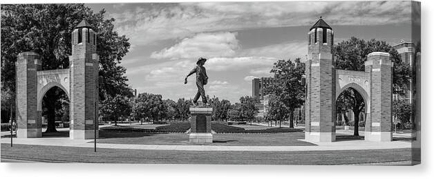 Sower Statue Canvas Print featuring the photograph Sower Statue on the campus of the University of Oklahoma in panoramic black and white by Eldon McGraw