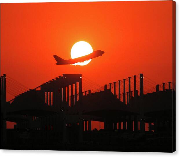 B747 Canvas Print featuring the photograph B747 Sunset Take-Off by Graham Taylor
