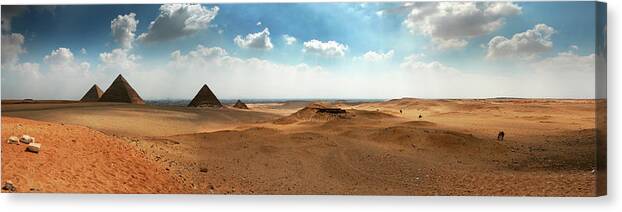 Panoramic Canvas Print featuring the photograph Panoramic Of The Giza Pyramids On A by Brunette