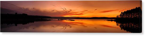 Angle Canvas Print featuring the photograph Golden sunset panorama on a quiet lake by Sebastien Coursol