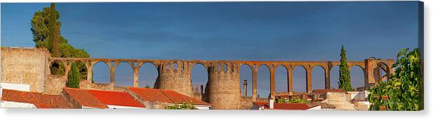 Roman Canvas Print featuring the photograph the Roman aqueduct of Beja by Micah Offman