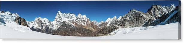 Scenics Canvas Print featuring the photograph Mountain Peaks Snowy Wilderness Panorama by Fotovoyager